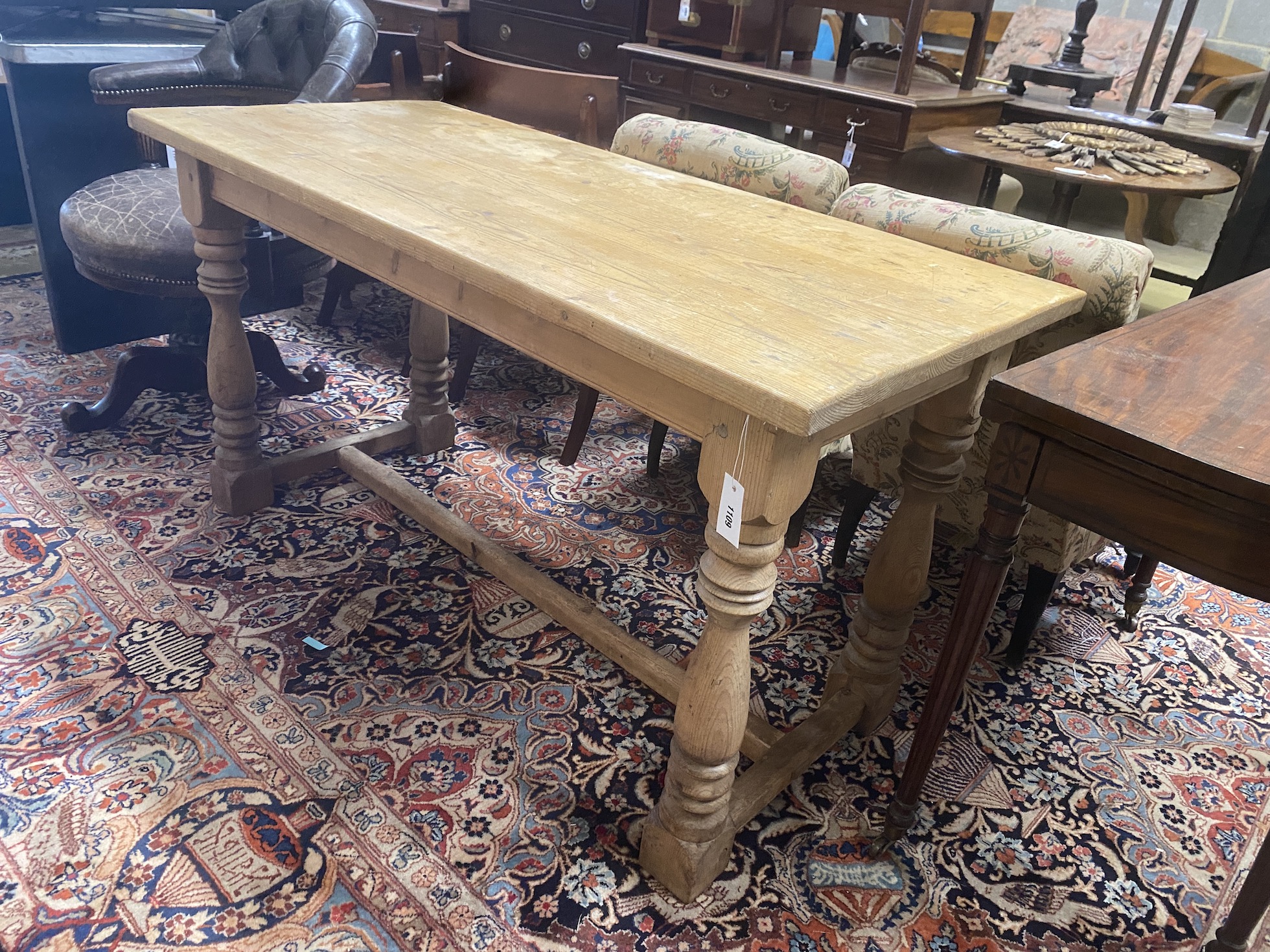 A small Victorian style rectangular pine refectory table, length 142cm, depth 64cm, height 76cm
